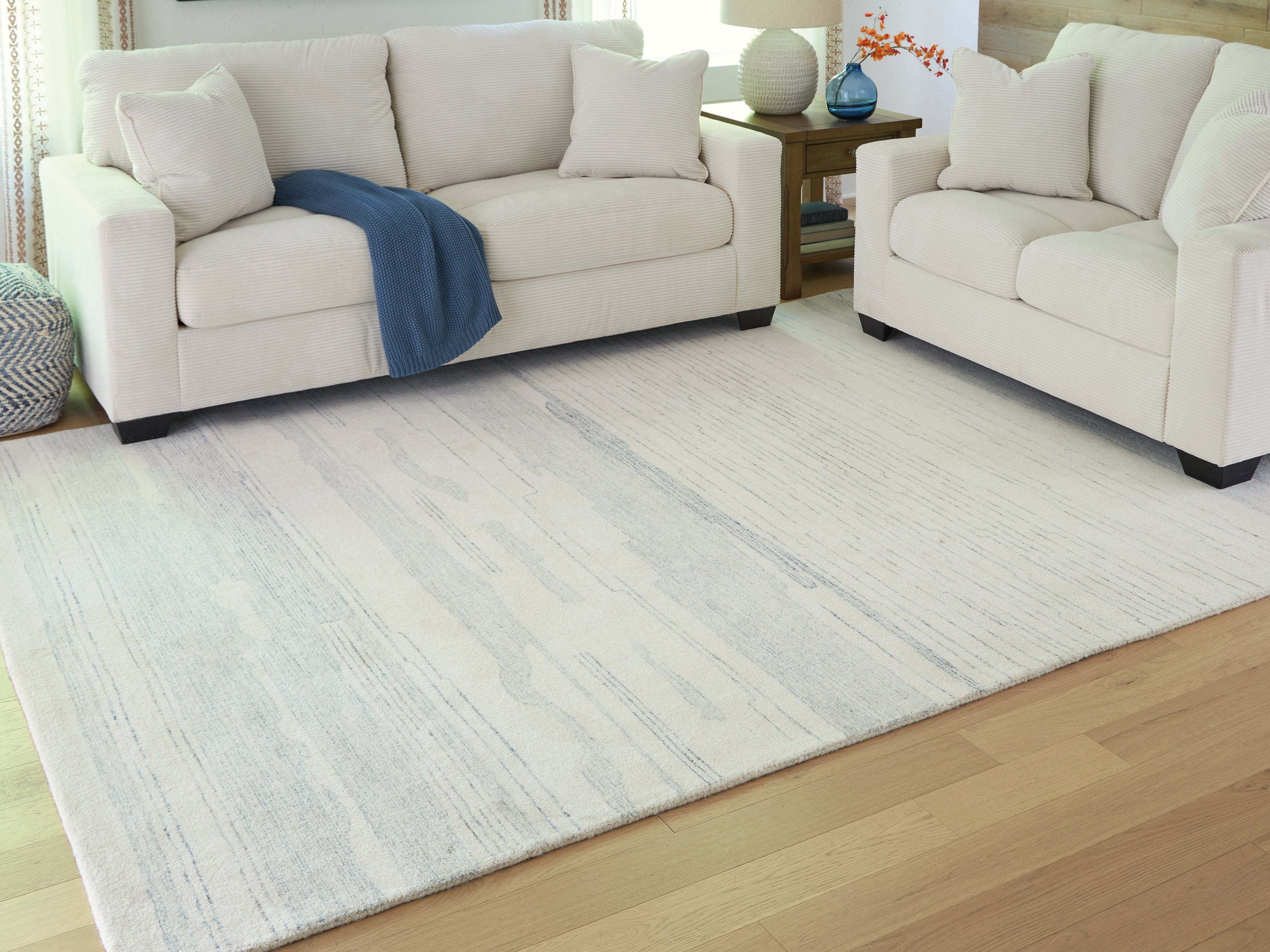 Family Deals Furniture - Ashley Furniture - Genemost Rug - 7'8" x 10' Area Rug / Ivory/Blue - R407841