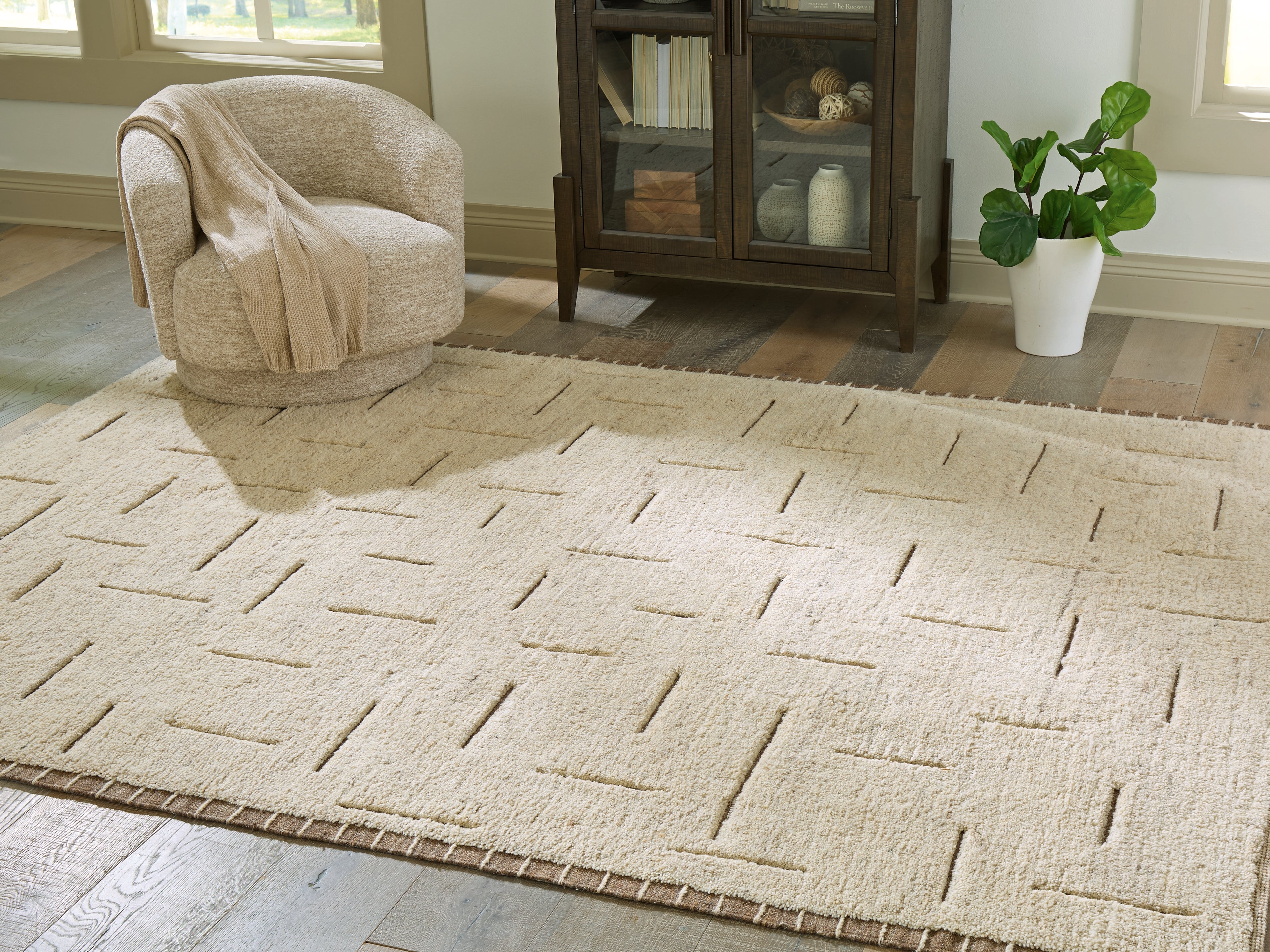 Family Deals Furniture - Ashley Furniture - Clayman Rug - Large Rug / Beige/Brown - R408341